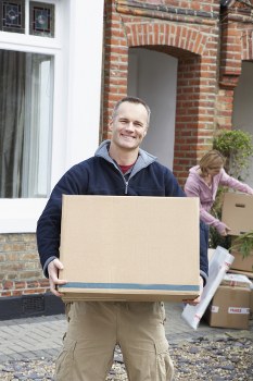 Removal team planning a house move in a Dulwich residential street