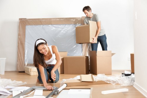 Man with van moving boxes and furniture for a Dulwich customer