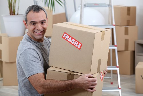 Removal van and moving boxes near Dulwich residential streets