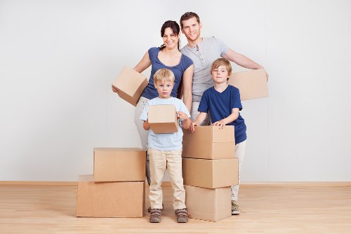 Prepared moving boxes and household items ready for a Dulwich removal van